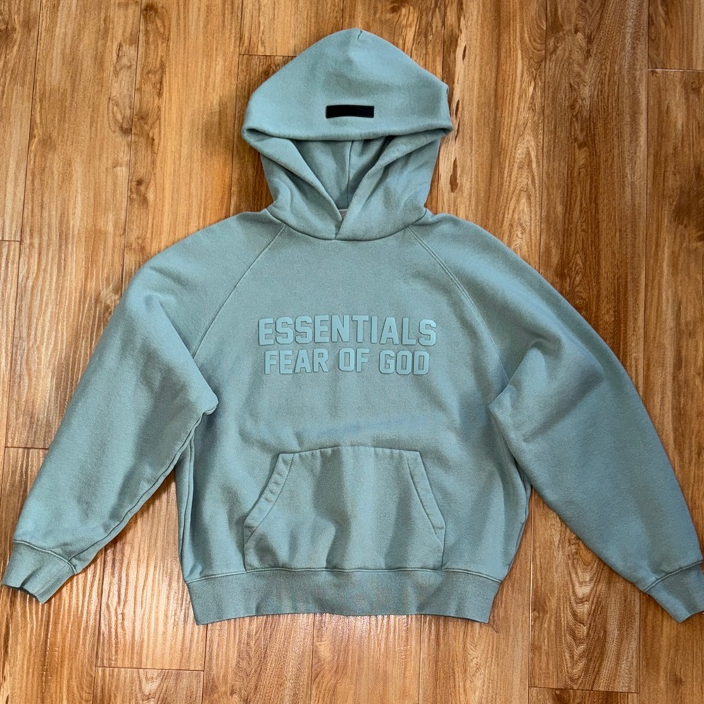 Fear of God Essentials Hoodie in color ‘Sycamore’